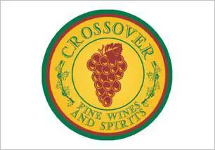 A yellow and green logo with grapes on it.